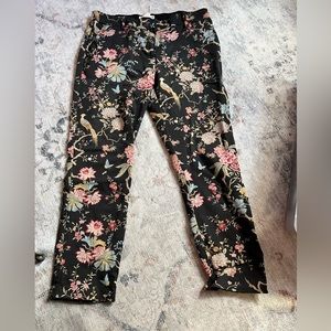 Floral/ bird print pants with black background.